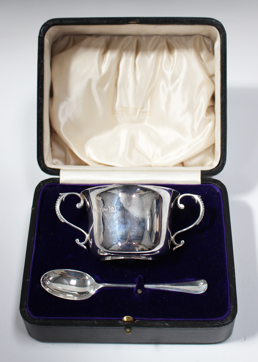 A George V silver porringer and spoon, Birmingham 1913 and 1916 by William Hutton & Sons Ltd, height