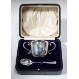 A George V silver porringer and spoon, Birmingham 1913 and 1916 by William Hutton & Sons Ltd, height