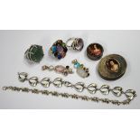 A group of mostly silver jewellery, including three gem set rings, two gem set pendants, two