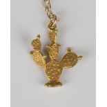 A gold pendant, designed as a cactus, detailed '14K', length 2.8cm, with a 9ct gold oval link