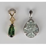 An 18ct white gold, Paraiba tourmaline and diamond drop shaped pendant, length 2.6cm, with a