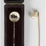 A gold stickpin, the glazed terminal decorated with a vintage motor vehicle, length 7.4cm, cased,