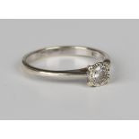 A 9ct white gold and diamond single stone ring, mounted with a circular cut diamond, detailed '.20',
