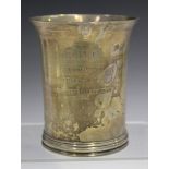 A Victorian silver beaker of flared cylindrical form, engraved with a coat of arms and