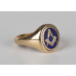 A 9ct gold and blue enamelled Masonic rotating signet ring, one side with a square and compasses