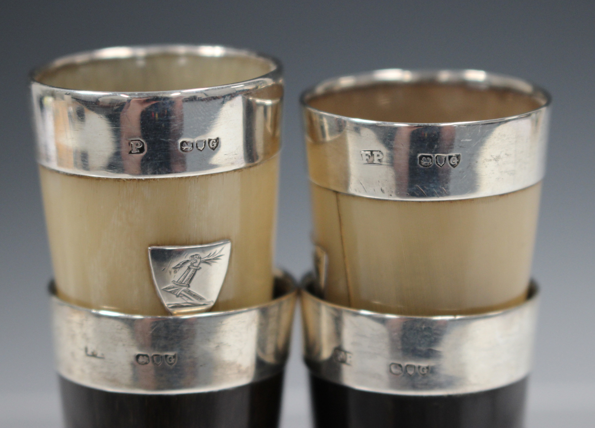 A set of four late Victorian silver mounted horn shot measure beakers, each of tapering - Image 2 of 2