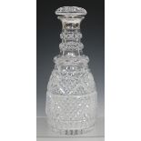 A George V silver mounted cut glass decanter and stopper, London 1934, height 27cm (crack to neck).