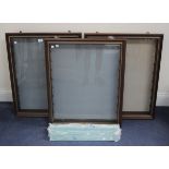 Three wall mounted glazed display cabinets with shelves.Buyer’s Premium 29.4% (including VAT @