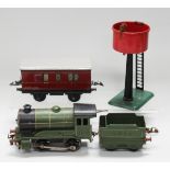 A small collection of Hornby gauge O railway items, including an 0-4-0 locomotive and tender 'LNER',