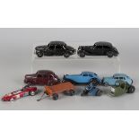 A small collection of Dinky Toys vehicles, comprising a No. 36d Rover, a No. 30b Rolls-Royce, a