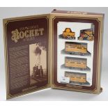 A Hornby Railways gauge OO Stephenson's Rocket set, comprising locomotive, tender and three coaches,