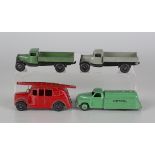 Four Dinky Toys commercial vehicles, comprising a No. 25e third type tipping wagon, a No. 25 third