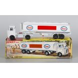 A French Dinky Supertoys No. 894 Unic Boilet car transporter, within a blue and white striped box,