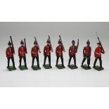 A large collection of Britains lead military figures, including greatcoats, sailors, cavalry,