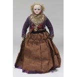 A French bisque head and shoulders doll with blonde wig, fixed blue glass eyes, painted features and