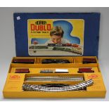 A Hornby Dublo three-rail tank goods set, comprising 2-6-4 tank locomotive, goods wagons and