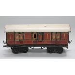 A Bing gauge O guard's/luggage van, finished in LMS maroon and black livery (playwear, surface and