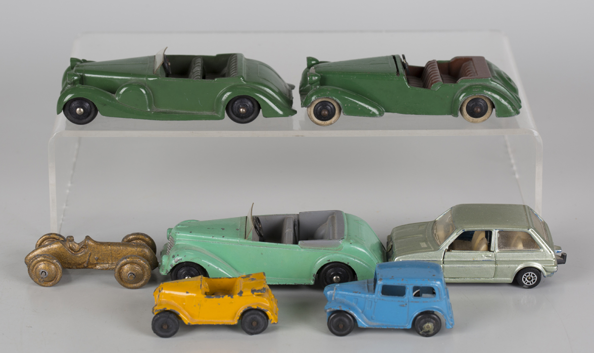 Five Dinky Toys cars, comprising a No. 38A Armstrong Siddeley, a No. 38D Alvis, a No. 38c Lagonda, a