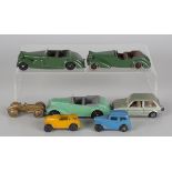 Five Dinky Toys cars, comprising a No. 38A Armstrong Siddeley, a No. 38D Alvis, a No. 38c Lagonda, a