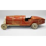 A Tipp & Co tinplate clockwork racing car, finished in burgundy, cream and gilt with race number