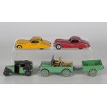 A collection of playworn Dinky Toys cars and accessories, including a No. 163 Bristol 450, two No.