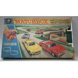 A Matchbox M-2 Motorised Motorway part set, boxed, together with a collection of Matchbox, Husky and