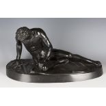 After the antique - The Dying Gaul, a late 19th century German dark brown patinated cast bronze