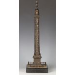 A 19th century French brown patinated cast bronze model of the Colonne Vendôme, finely modelled with