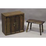 A small 20th century oak cabinet, the two doors formed from 18th century oak panels, height 54cm,