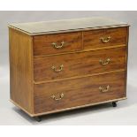 A Victorian mahogany chest, fitted with gilt bronze Gothic style handles, later raised on castors,
