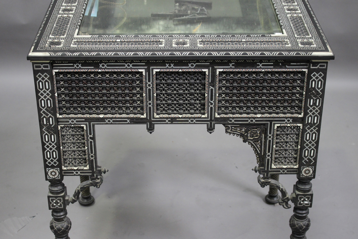 A late 19th century Middle Eastern ebonized bijouterie table, inset with overall panels of finely - Image 6 of 10