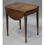 A small George III mahogany oval Pembroke table, fitted with a single drawer and inlaid with boxwood