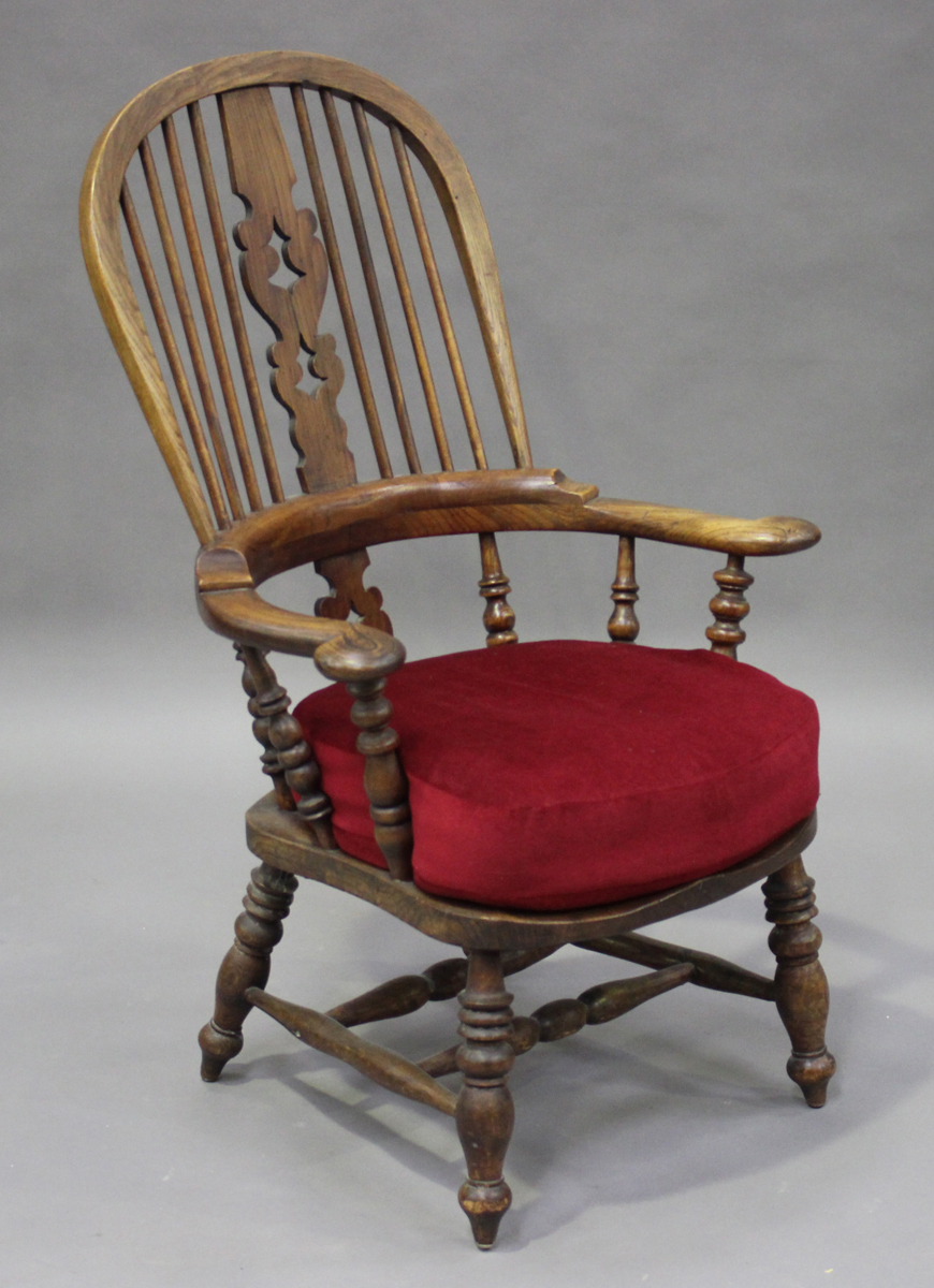 A late Victorian ash and elm tub back Windsor armchair, height 104cm, width 65cm, depth 63cm.Buyer’s