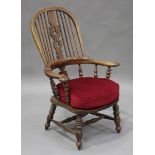 A late Victorian ash and elm tub back Windsor armchair, height 104cm, width 65cm, depth 63cm.Buyer’s