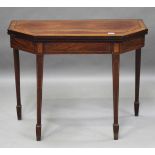 A George III mahogany and satinwood crossbanded fold-over card table with boxwood line inlay and