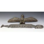 A Papua New Guinea carved wooden finial of bird form, width 64cm, together with another New Guinea