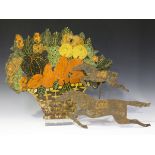 A painted and fret cut sheet metal fireguard in the form of a basket of flowers, width 60cm,