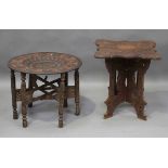 An early 20th century Indian carved hardwood occasional table, height 54cm, width 51cm, together