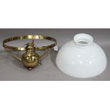 A late 19th/early 20th century brass rise-and-fall hanging ceiling lamp with large opaline glass