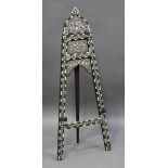 A late 19th/early 20th century Anglo-Indian hardwood easel, profusely inlaid in ebony and bone,