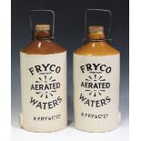 Two 2-gallon stoneware 'Fryco Aerated Waters' flagons, with printed wording to both sides, height