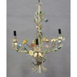 An early 20th century French tole painted three-branch ceiling light with overall applied wrought