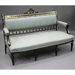 A late 19th century ebonized five-piece salon suite with mother-of-pearl and brass line inlaid