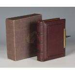 A Victorian gilt metal mounted leather bound cartes-de-visite case, the gilt metal mounts