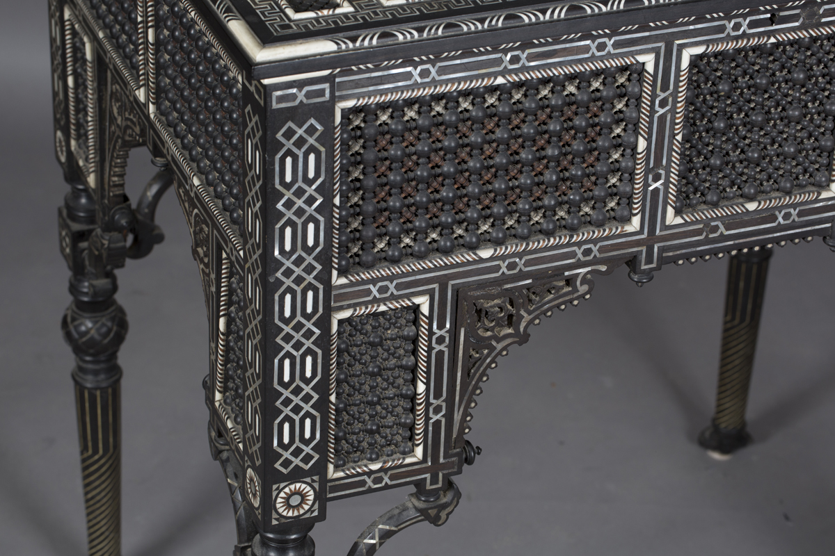 A late 19th century Middle Eastern ebonized bijouterie table, inset with overall panels of finely - Image 2 of 10