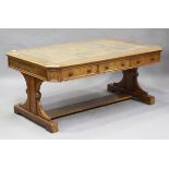 A late Victorian Gothic Revival oak library table by Bulstrode of Cambridge, the top inset with