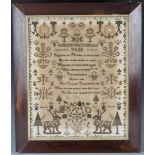 An early Victorian needlework sampler by Eliza Wilkins, finely worked in coloured silks with a