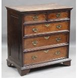 A 17th century and later oak chest of drawers, the front with applied mouldings, raised on later