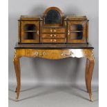 A late Victorian burr walnut and boxwood inlaid bonheur-du-jour with overall applied gilt metal