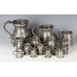 A group of mainly Victorian pewter measures, including a quart by James Yates.Buyer’s Premium 29.